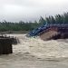 বন্যার পানির চাপে ভেঙে গেছে স্লুইসগেট
