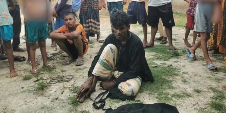 হিজাব পরে চুরি করতে গিয়ে অস্ত্রসহ যুবক আটক